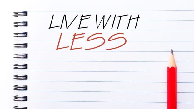 White blank  notebook page with red pencil on the right, with copy space available