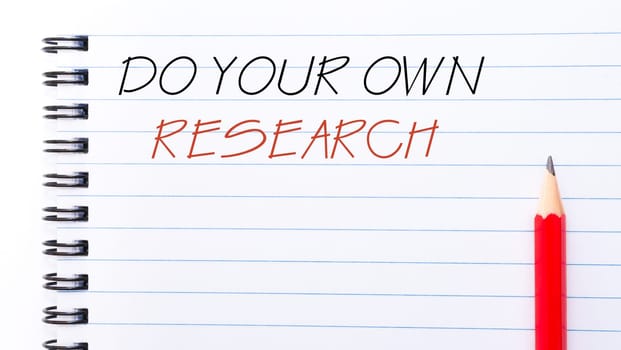 White blank  notebook page with red pencil on the right, with copy space available