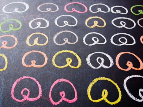 Colorfull pretzel drawing on a chalk board