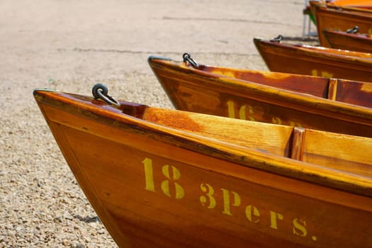 View over the prow of rowing boats on the shore of Lake Titisee
