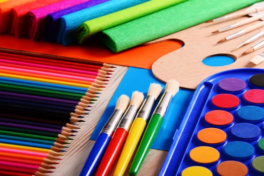 Composition with school accessories for painting and drawing.
