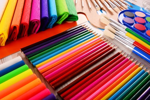 Composition with school accessories for painting and drawing.