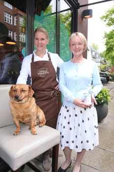 Helga Frambach (HARDYS MANUFAKTUR for dog food).. and Cornelia Poletto with dachshund "Franz"",press event for the start of the ""HARDYS TRAUM EDITION CORNELIA POLETTO"" dog food,at the Cucina Cornelia Poletto,Hamburg,19.05.2015"