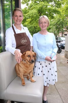 Helga Frambach (HARDYS MANUFAKTUR for dog food).. and Cornelia Poletto with dachshund "Franz"",press event for the start of the ""HARDYS TRAUM EDITION CORNELIA POLETTO"" dog food,at the Cucina Cornelia Poletto,Hamburg,19.05.2015"