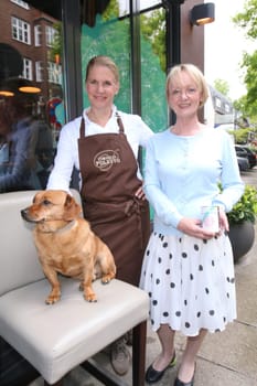 Helga Frambach (HARDYS MANUFAKTUR for dog food).. and Cornelia Poletto with dachshund "Franz"",press event for the start of the ""HARDYS TRAUM EDITION CORNELIA POLETTO"" dog food,at the Cucina Cornelia Poletto,Hamburg,19.05.2015"