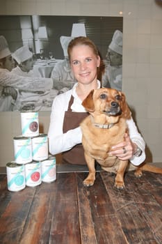 Cornelia Poletto with dachshund "Franz"" (7 years old from the shelter),press event for the start of the ""HARDYS TRAUM EDITION CORNELIA POLETTO"" dog food,in the Cucina Cornelia Poletto,Hamburg,19.05.2015"
