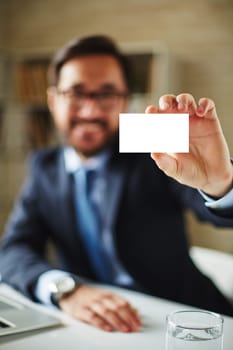 Hand of businessman with blank card introducing himself to partner