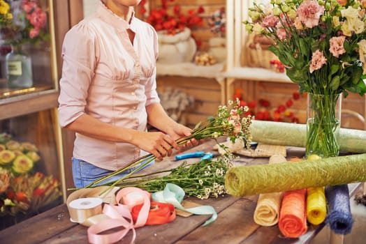 Modern florist working in design studio