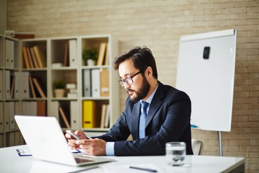Male employee working in office