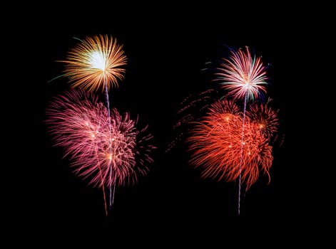 Colorful exploded fireworks display, isolated on black background