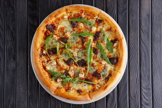Pizza with various kinds of cheese, top view