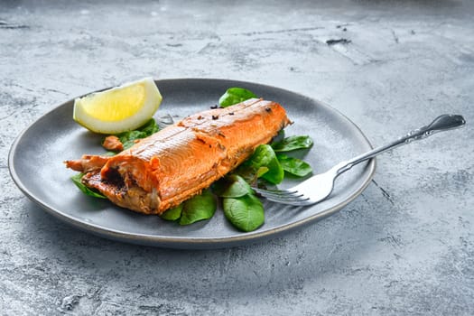 Red salmon baked in oven with spice