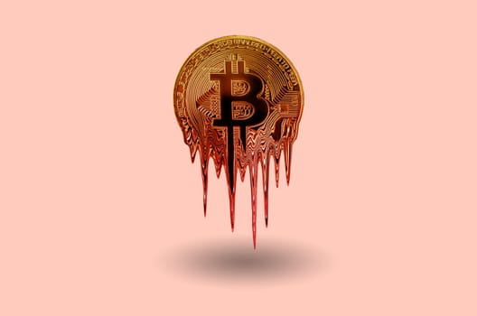 Melted bitcoin metal golden coin is melting on pink background. Hot price or value and high exchange rate of crypto currency. Crisis and fall to lose investments due to financial risk