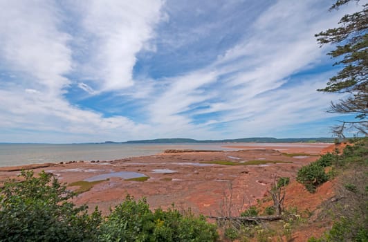 High Clouds Over a Tidal Basin in the Thomas Cove Coastal Reserve in Nova Scotia
