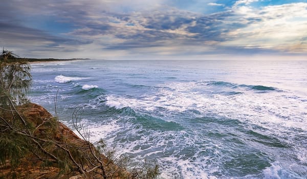 Coral Sea, a part of Pacific Ocean looking north from Coolum along the seashore of the Sunshine Coast, Queensland.