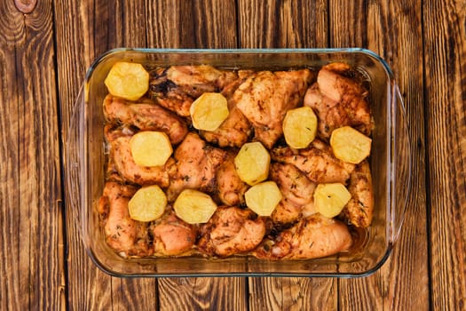 Top view of baked chicken and potato