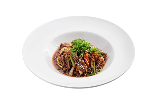 Wok with beef and green beans isolated on white background