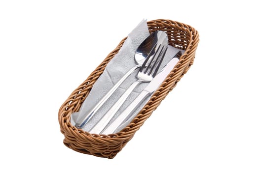 Set of cutlery in basket isolated on white background