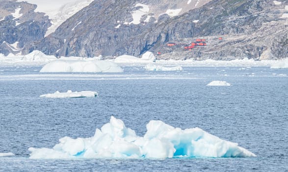 Antarctic iceberg landscape in Cierva Cove - a deep inlet on the west side of the Antarctic Peninsula, surrounded by rugged mountains and dramatic glacier fronts.