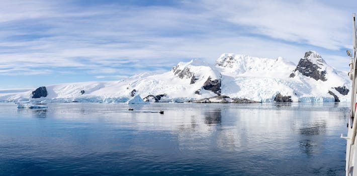Antarctic iceberg landscape in Cierva Cove - a deep inlet on the west side of the Antarctic Peninsula, surrounded by rugged mountains and dramatic glacier fronts.
