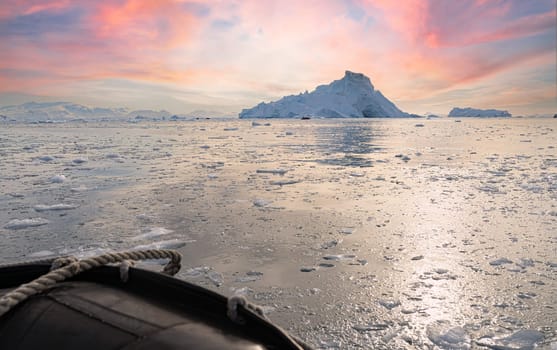 Antarctic iceberg landscape in Cierva Cove - a deep inlet on the west side of the Antarctic Peninsula, surrounded by rugged mountains and dramatic glacier fronts.
