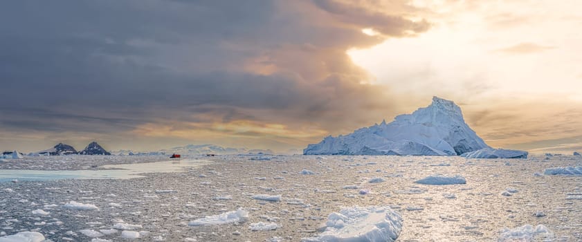 Antarctic iceberg landscape in Cierva Cove - a deep inlet on the west side of the Antarctic Peninsula, surrounded by rugged mountains and dramatic glacier fronts.