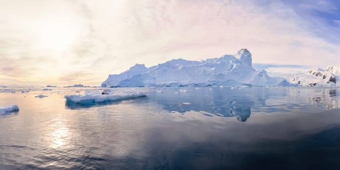 Antarctic iceberg landscape in Cierva Cove - a deep inlet on the west side of the Antarctic Peninsula, surrounded by rugged mountains and dramatic glacier fronts.