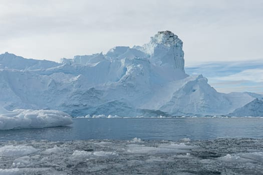 Antarctic iceberg landscape in Cierva Cove - a deep inlet on the west side of the Antarctic Peninsula, surrounded by rugged mountains and dramatic glacier fronts.