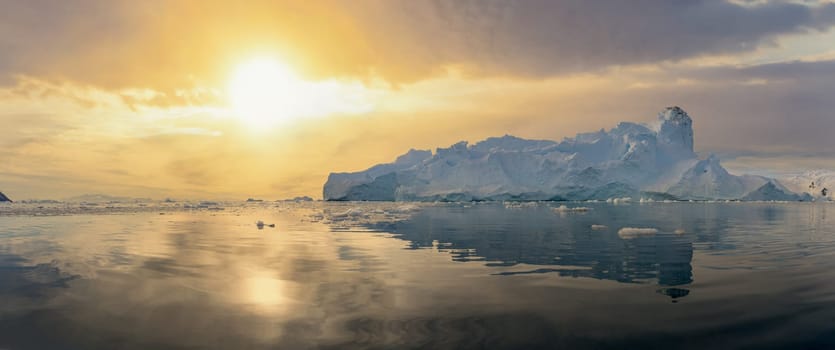 Antarctic iceberg landscape in Cierva Cove - a deep inlet on the west side of the Antarctic Peninsula, surrounded by rugged mountains and dramatic glacier fronts.