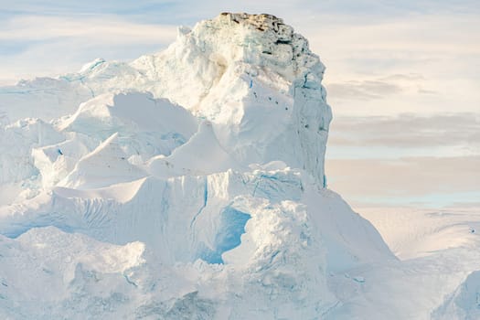Antarctic iceberg landscape in Cierva Cove - a deep inlet on the west side of the Antarctic Peninsula, surrounded by rugged mountains and dramatic glacier fronts.