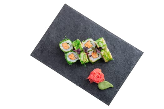 Set of rolls with crab paste, seaweed chuka salad isolated on white background