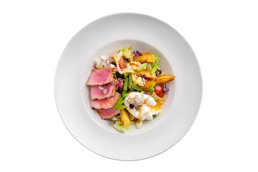 Grilled tuna with potato, cabbage, green beans and poached egg isolated on white background