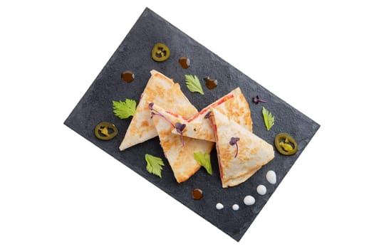 Spicy tortilla with chicken, cheese and tomato isolated on white background