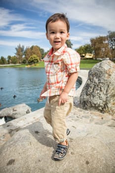 Young Chinese and Caucasian Boy Having Fun at the Park.