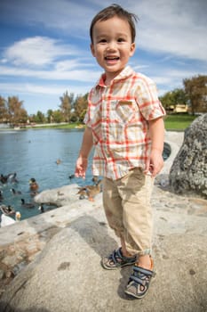 Young Chinese and Caucasian Boy Having Fun at the Park.