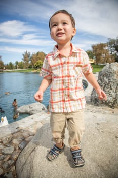 Young Chinese and Caucasian Boy Having Fun at the Park.