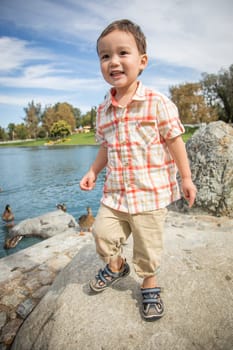 Young Chinese and Caucasian Boy Having Fun at the Park.