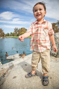 Young Chinese and Caucasian Boy Having Fun at the Park.