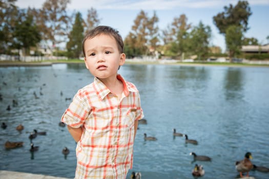 Young Chinese and Caucasian Boy Having Fun at the Park.