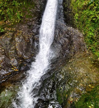 Whitelady waterfall in rain - Lydford Gorge, Dartmoor National Park, Devon, United Kingdom