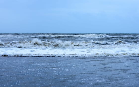 Blue Sea Waves against clear blue sky horizon. Nature Background.