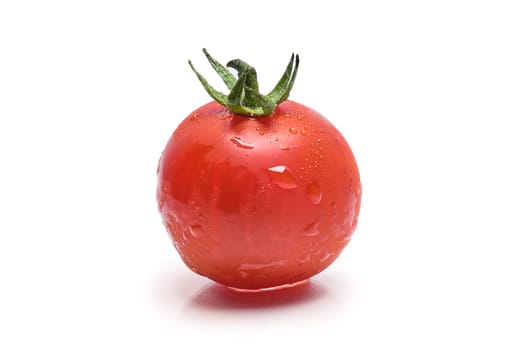 Fresh wet tomato cherry isolated on white background