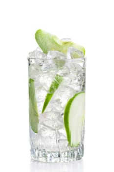 Glass of cold apple lemonade with ice isolated on white background