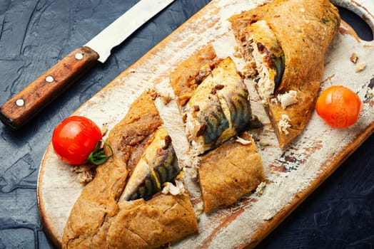 Seafood, mackerel roasted in spicy dough. Fish baked in dough