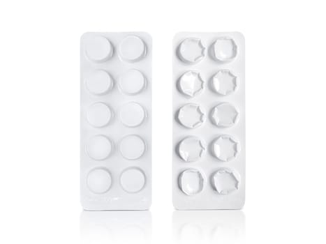 Package of pills and Used pills. Pharmacy and medicine concept