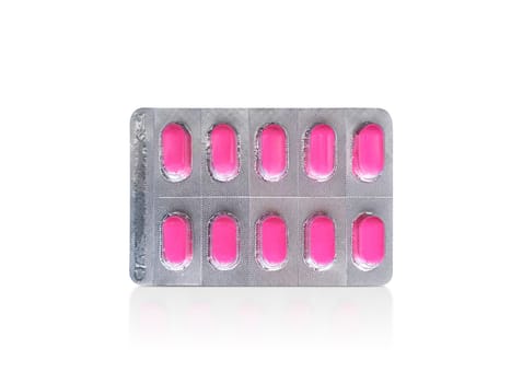 Package of pink pills. Pharmacy and medicine concept