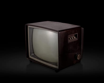 retro old television on black background