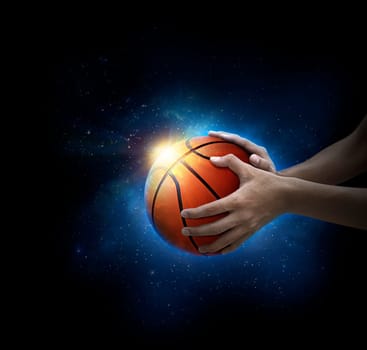 basketball ball in man's hand. basketball game concept