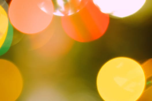 Background bokeh effect boof bright circles of red and orange color