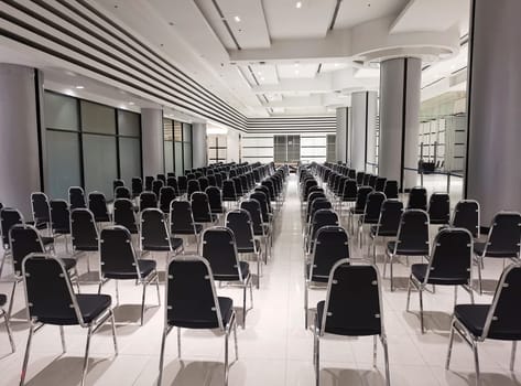 Empty chairs in a modern conference room. Shallow depth of field